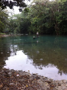 Belize, dory on river